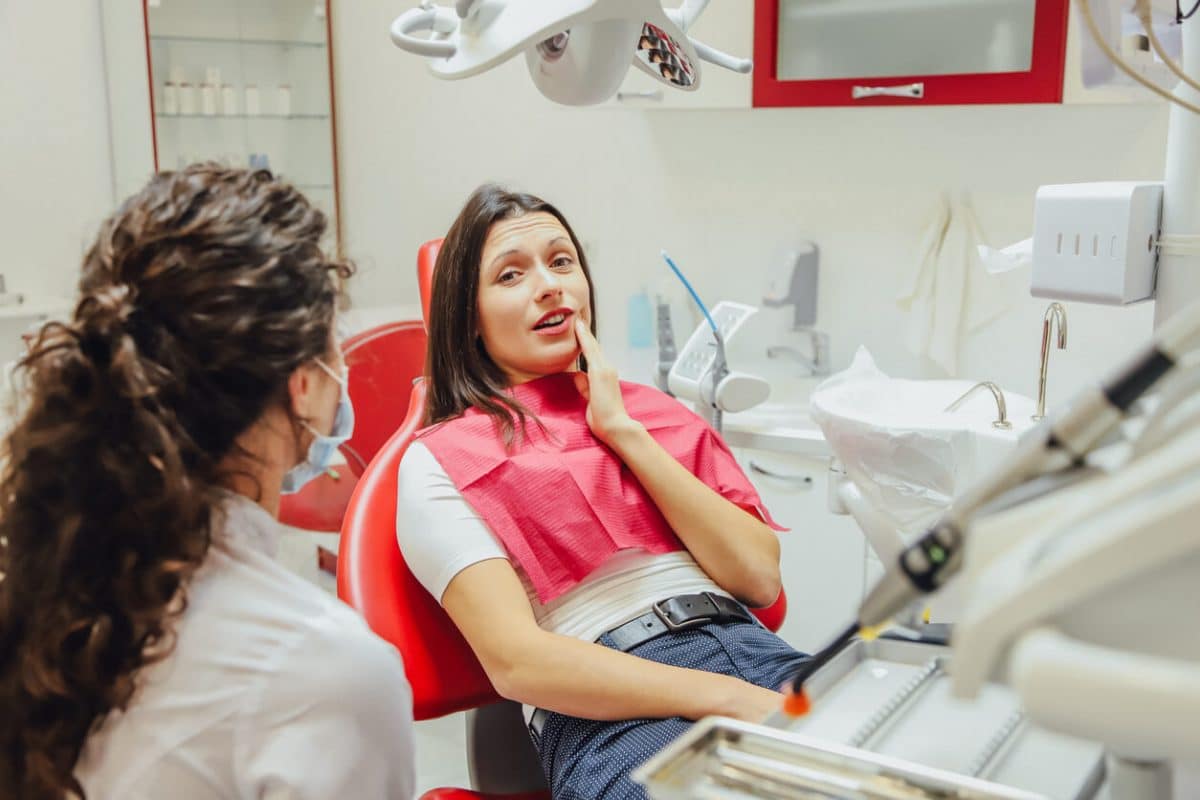 woman at dentist grinding teeth