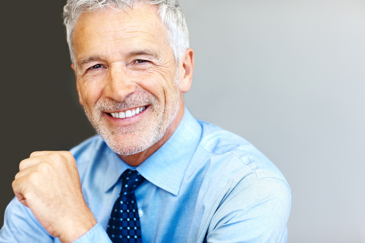 older man smiling